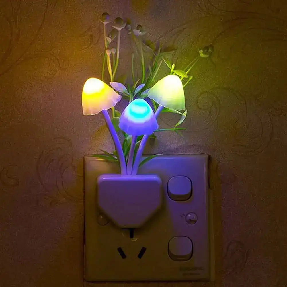 Colorful mushroom-shaped night light attached to a wall switch.
