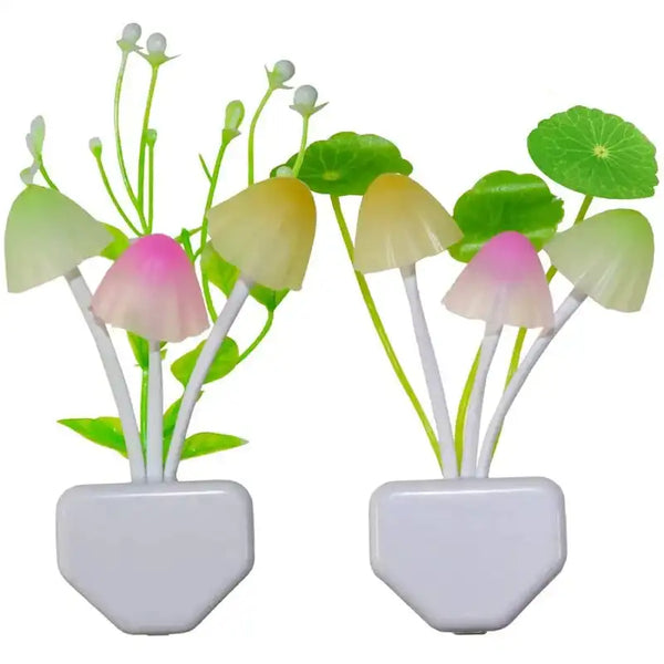 Two small potted plants with colorful mushroom-shaped lights on a white background